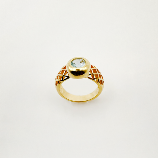 Bague ajourée plaquée or et pierre bleu
