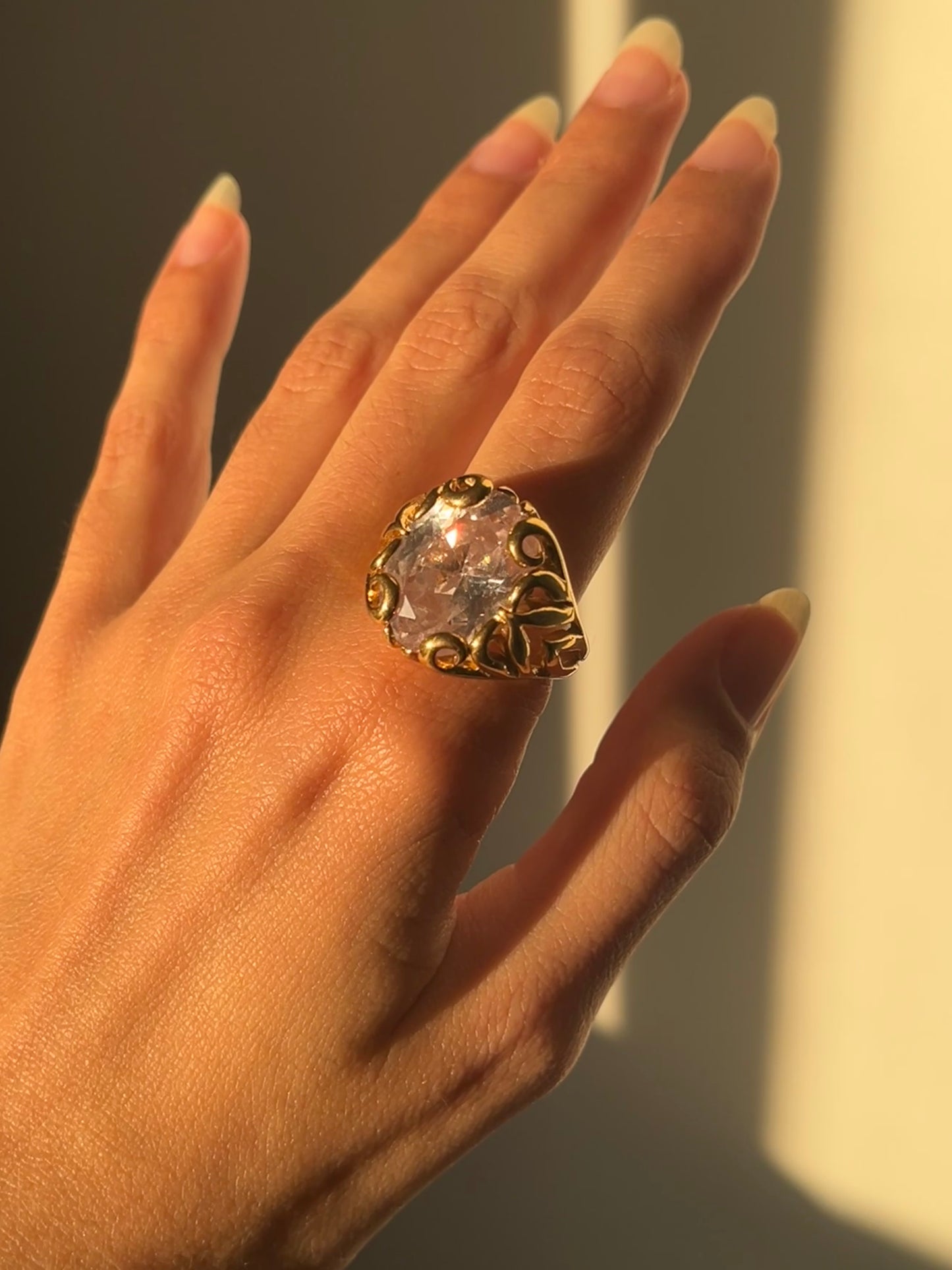 Golden ring with chunky crystal