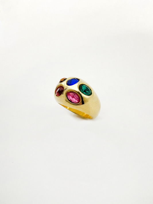 Ring adorned with colored stones