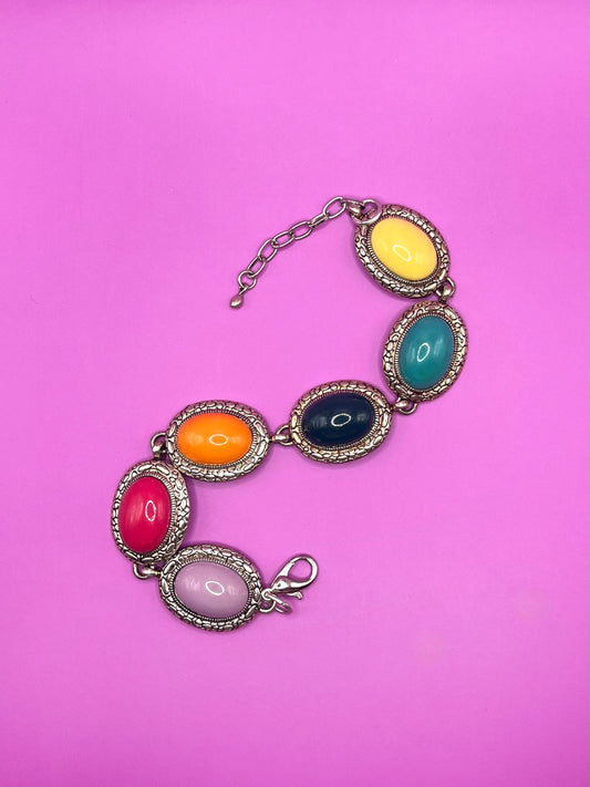  Silver bracelet with colored cabochons