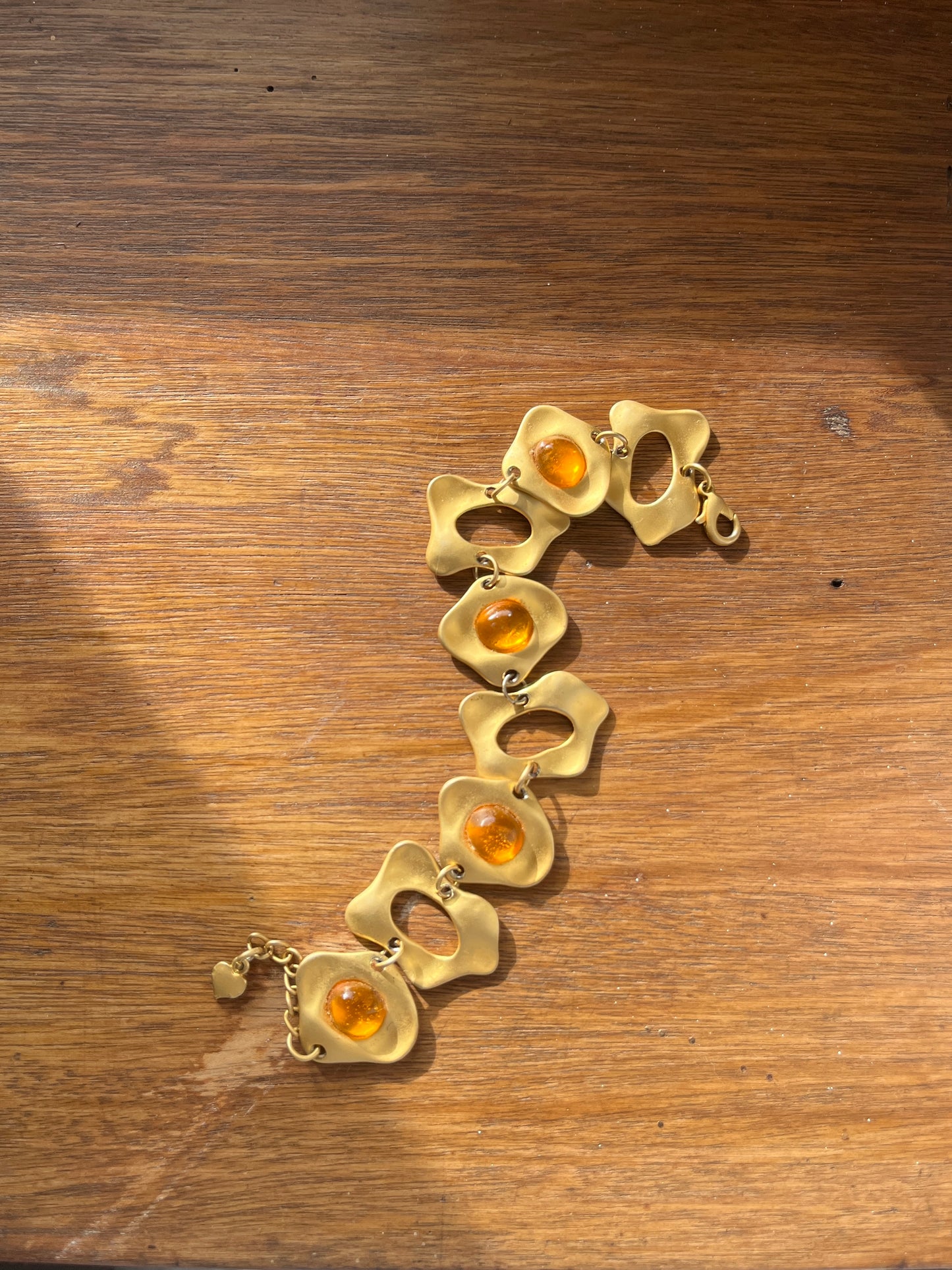 Bracelet doré cabochons orange