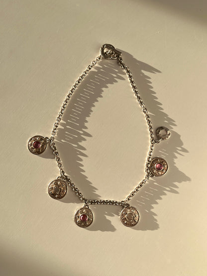 Collier argenté à breloques Naf Naf