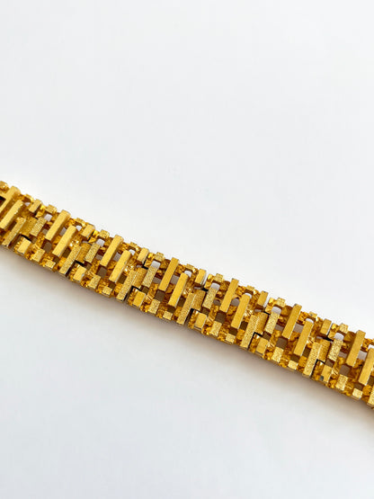 Bracelet doré brutaliste