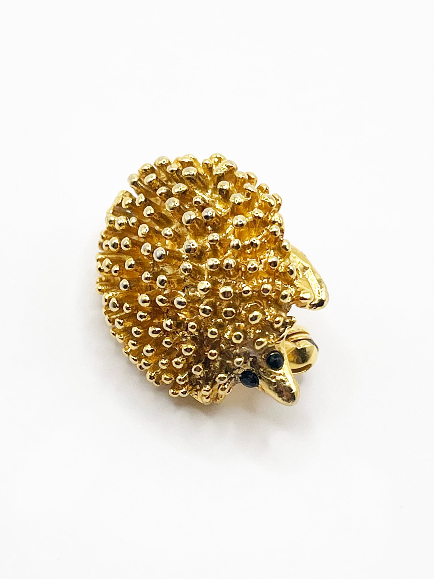 Broche hérisson dorée