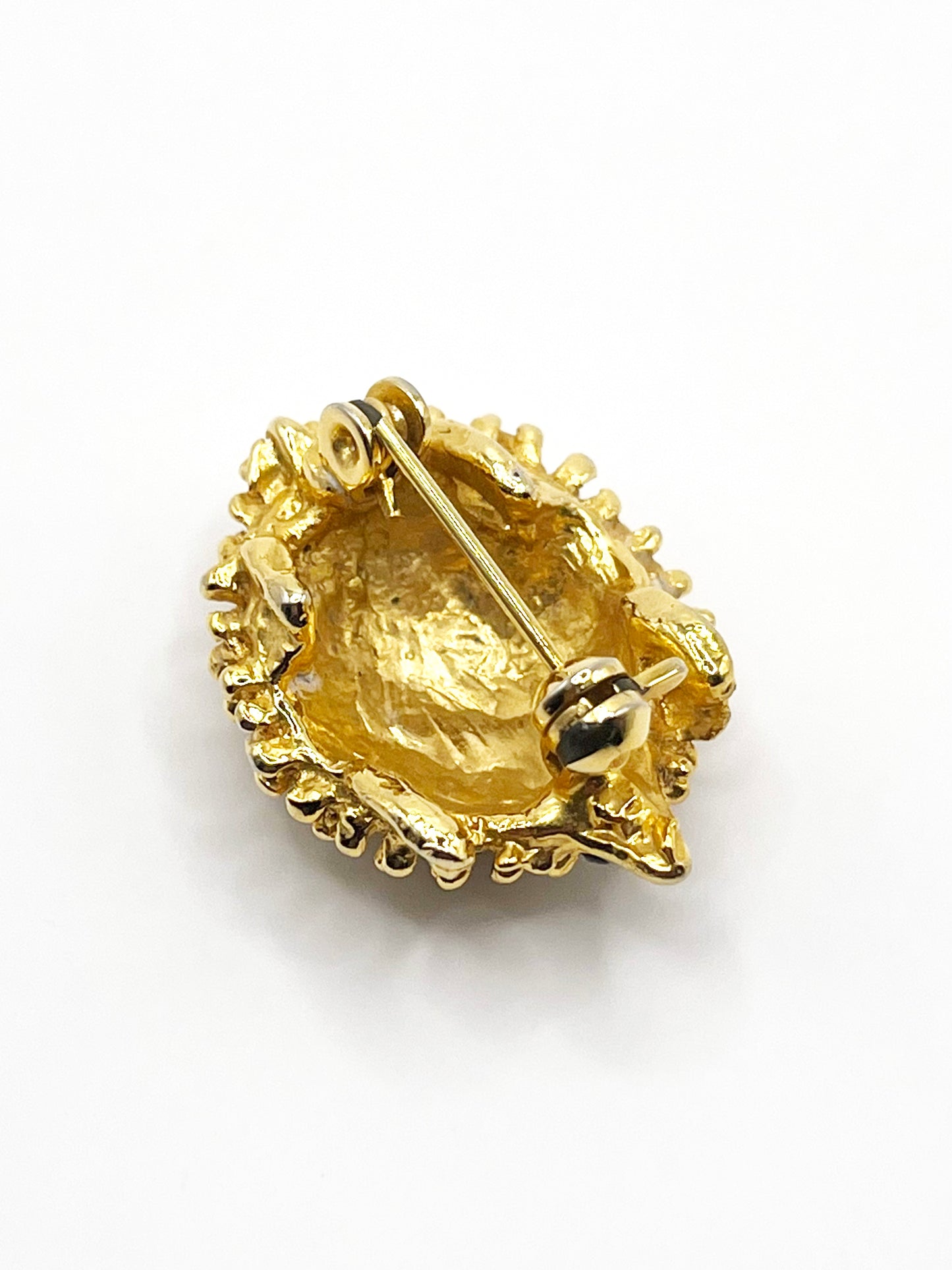 Broche hérisson dorée