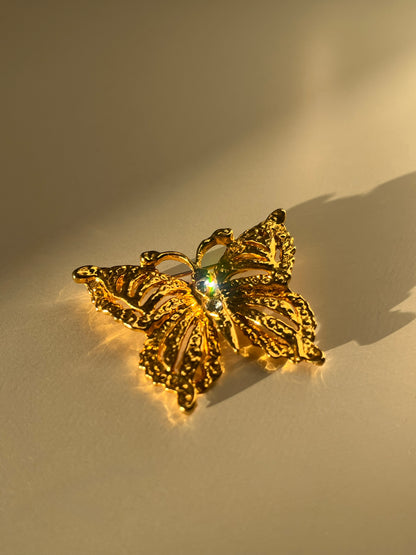 Broche papillon dorée