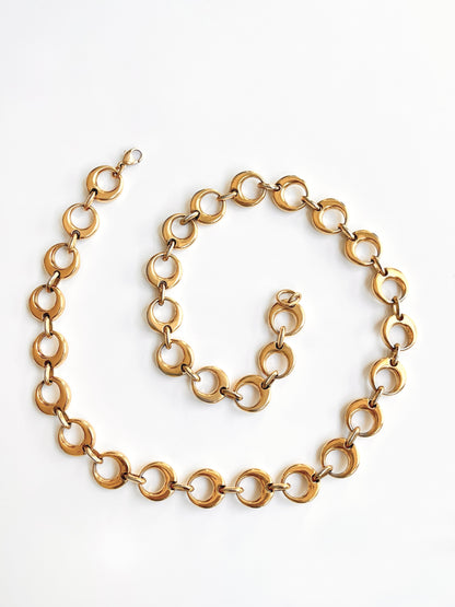 Golden half-moon necklace