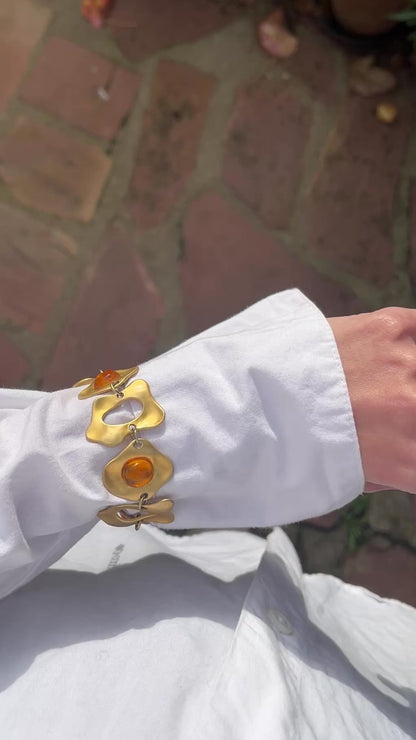 Bracelet doré cabochons orange